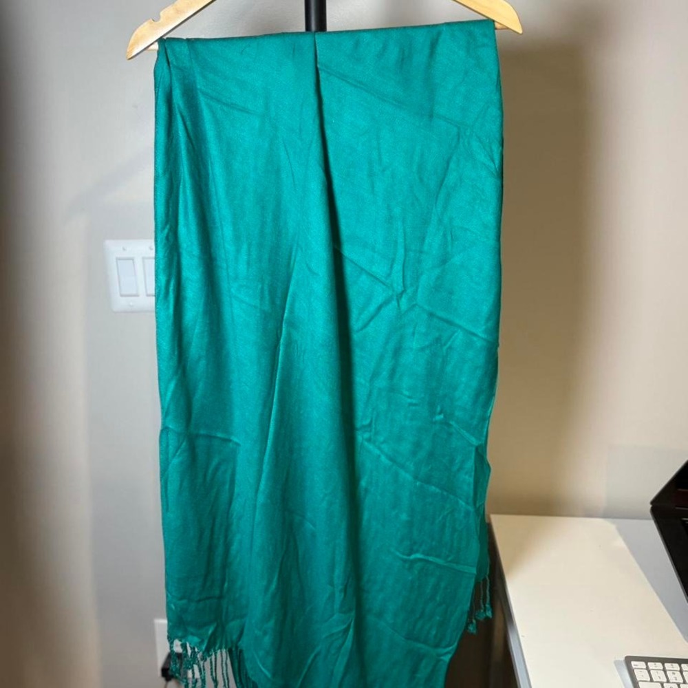 Teal blue scarf. In perfect condition.